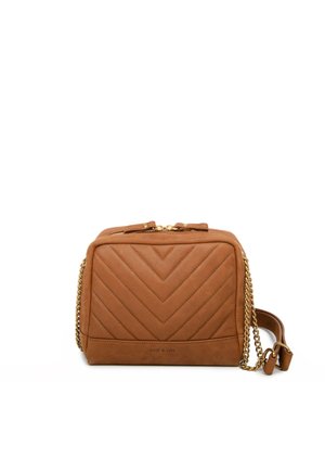 Tan leather handbag with a quilted chevron pattern. Features a gold chain strap and zipper closure. Compact rectangular shape.