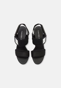 Calvin Klein Jeans Sandały na obcasie