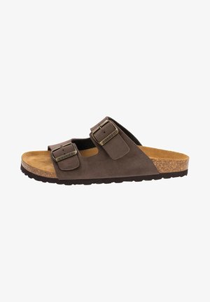 Brown suede sandal with two adjustable buckles, cork footbed, textured outsole, and open design for breathability.