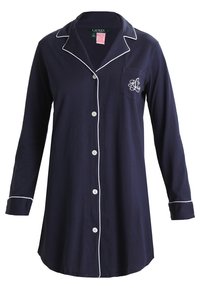 Marineblå pysjamasoverdel med lange ermer, hvit piping, og en brystlomme med monogram. Fem knapper foran. Myk bomullsmateriale.