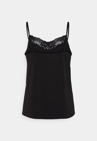 Czarny top na ramiączkach z regulowanymi cienkimi paskami, z koronkową szyfonową aplikacją przy dekolcie. Miękka tkanina o luźnym kroju.