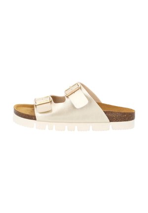 Metallic cream slide sandal with two adjustable straps, cork footbed, and white, textured rubber sole. Smooth leather texture.