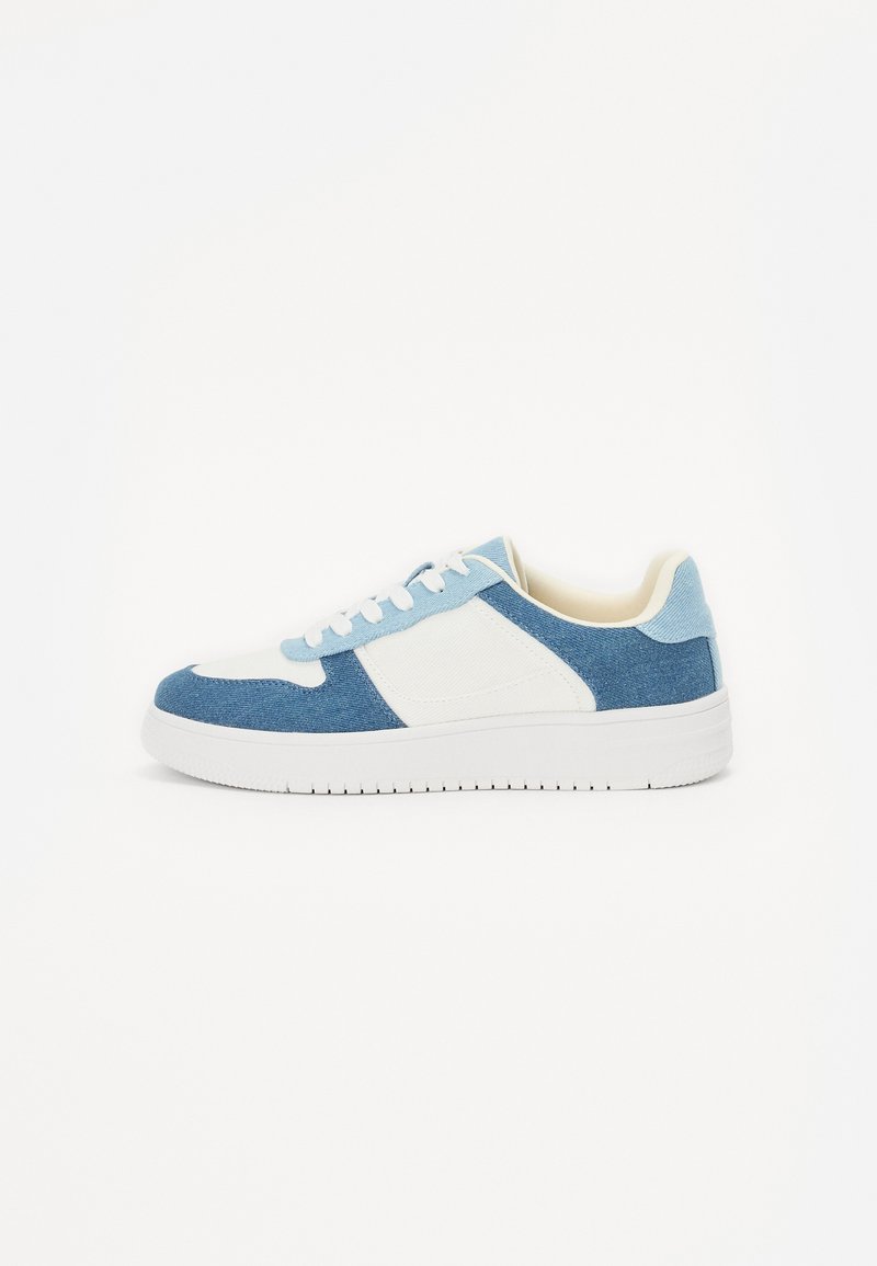 Blue and white sneakers with a textured upper, featuring a smooth white rubber sole, round toe, and lace-up closure.
