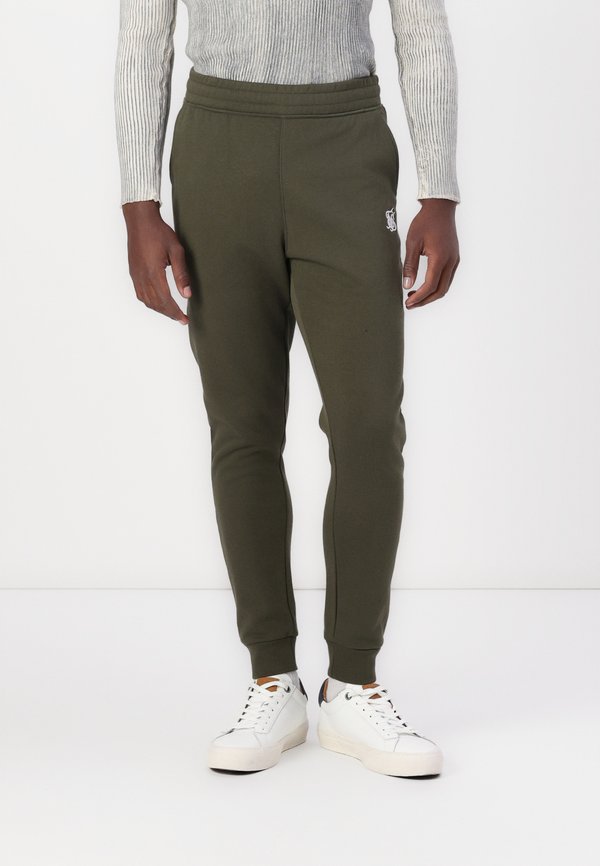 CORE CUFFED - Tracksuit bottoms - khaki