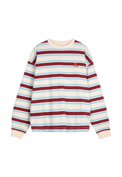 Koszulka z długim rękawem w kolorze kremowym z poziomymi paskami w kolorze czerwonym, niebieskim i jasnoniebieskim; posiada małe haftowane logo na piersi.