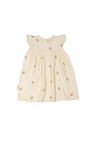 Kortärmad, krämfärgad klänning i bomull med en utsvängd kjol, prydd med spridda hundillustrationer och med knäppning bak.