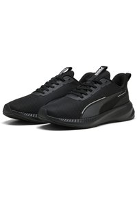 Black athletic sneakers with a mesh upper, textured design, and contrasting accents. Features a padded tongue and lace-up closure.