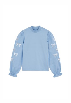 Bluză lungă cu mâneci, de culoare albastru deschis, cu mâneci bufante, manșete elastice și broderie cu fundiță albă pe brațe. Material din bumbac neted.