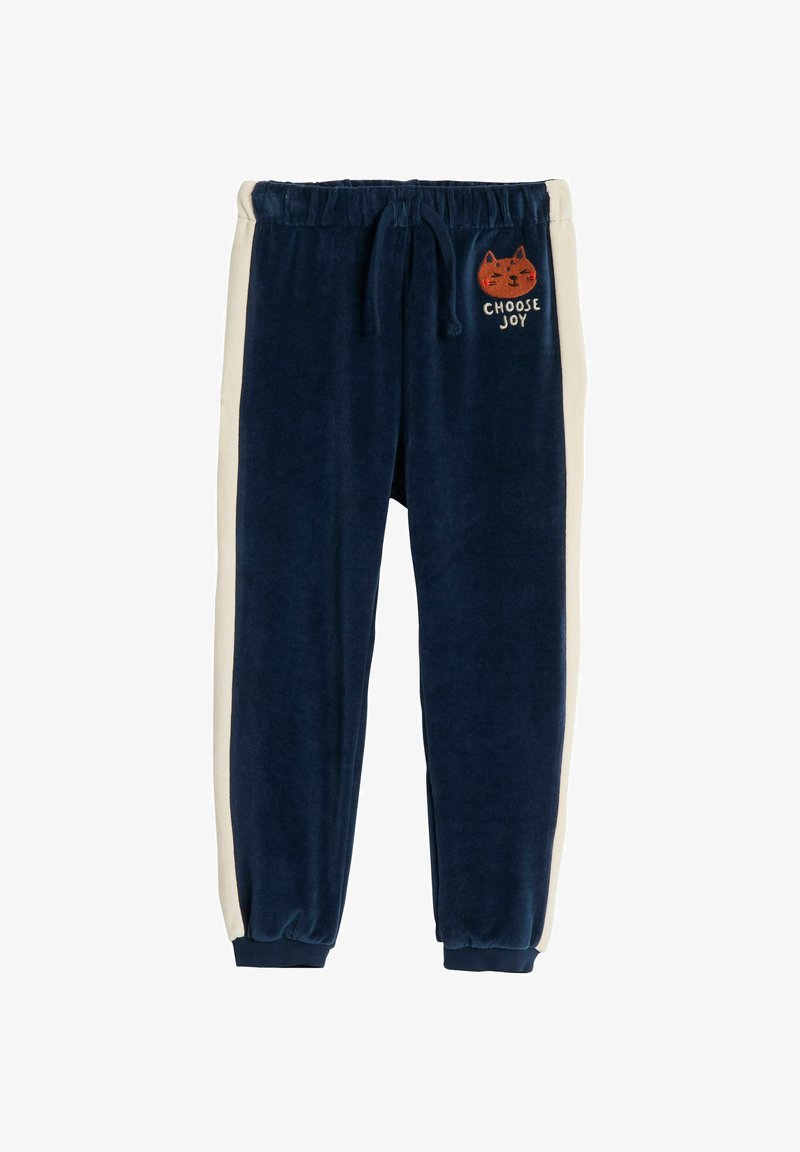 Granatowe welurowe spodnie dresowe z elastycznym paskiem w talii, kremowymi paskami po bokach oraz haftowaną twarzą kota z napisem "Wybierz radość". Ze ściągaczami przy kostkach.