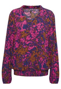 Blommönstrad tröja i lila, rosa och brunt. Har långa ärmar, rund halsringning och en rynkad nederkant. Tillverkad av lättviktig tyg.