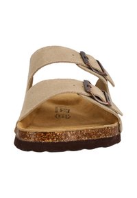 Bruna mockaskinn-sandaler med två justerbara spännen, korkfotbädd, gummisula och texturerad innersula för ökad komfort.
