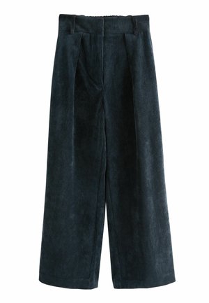 Pantaloni evazați din catifea în nuanță de teal închis, cu o textură ribbed, față plisată și un tiv elastic pentru confort.