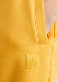 Jordan PANT - Trainingsbroek - yellow ochre