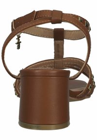 Mexx Sandaalit nilkkaremmillä - cognac
