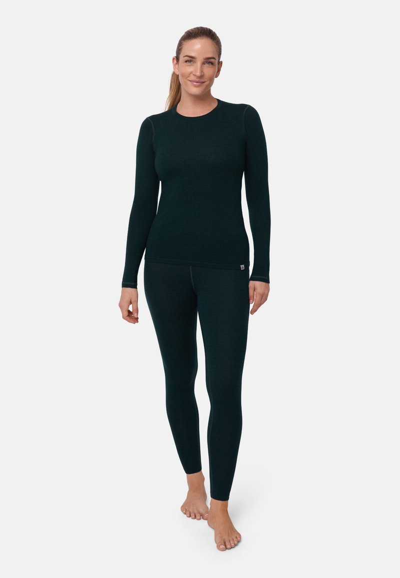 Green long-sleeve top and fitted leggings made from a soft, textured fabric. Both pieces feature a round neckline and minimal branding.