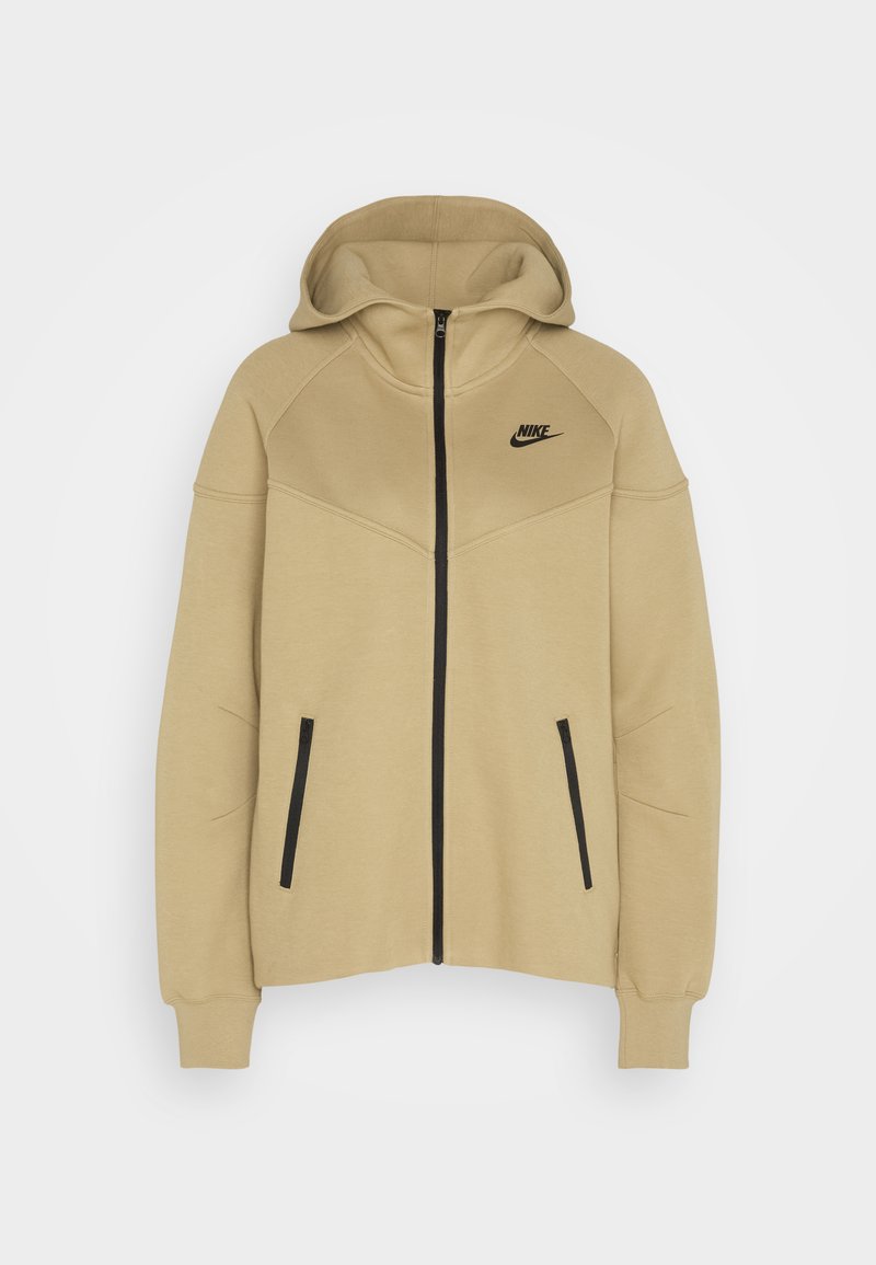 Beige Kapuzenpullover mit einem Frontreißverschluss, kontrastierenden schwarzen Akzenten an den Taschen und dem Logo, weichem Stoff und einer lockeren Passform.