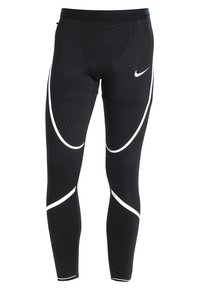 Leggings de sport noirs avec un motif texturé, dotés de lignes d'accentuation blanches et d'une coupe ajustée pour le confort et la flexibilité.