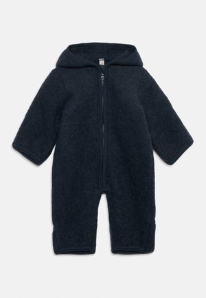 Navy blue one-piece baby jumpsuit with a front zipper and attached hood, made from soft, textured fabric.