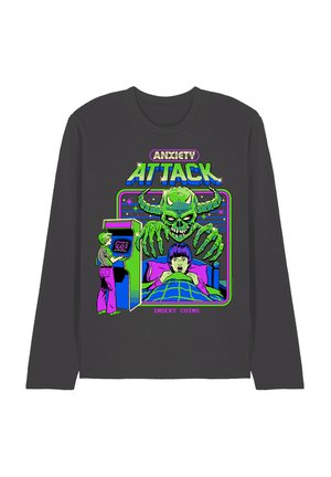 Dark long-sleeve shirt with neon arcade game design showing a monster looming over a child in bed and a person playing an arcade machine.