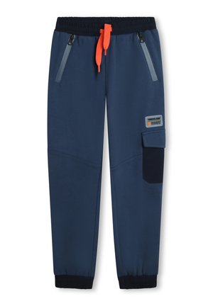 Joggers bleu marine avec taille élastique, cordon de serrage orange, poches latérales zippées et une poche patch sur la jambe gauche. Tissu lisse et poignets resserrés.