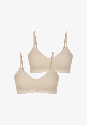 Beige bralettes with adjustable thin straps, soft fabric, smooth texture, and a v-neck design. Two pieces displayed, basic style.