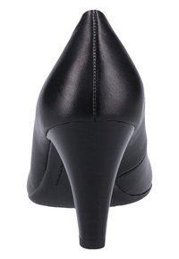 Black leather high heel shoe with a pointed toe. Smooth texture, seam detailing at the back, and a tapered stiletto heel.