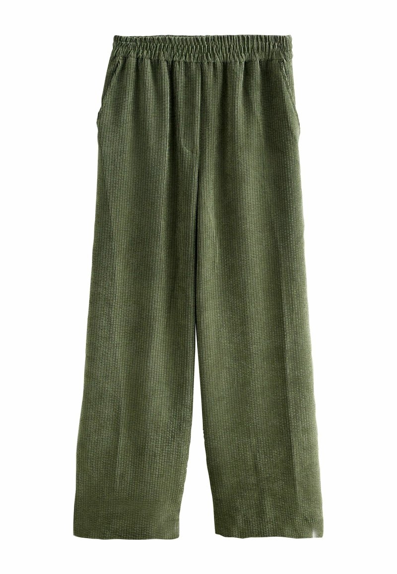 Green corduroy wide-leg pants with an elastic waistband and side pockets. Features vertical ribbed texture and a relaxed fit.