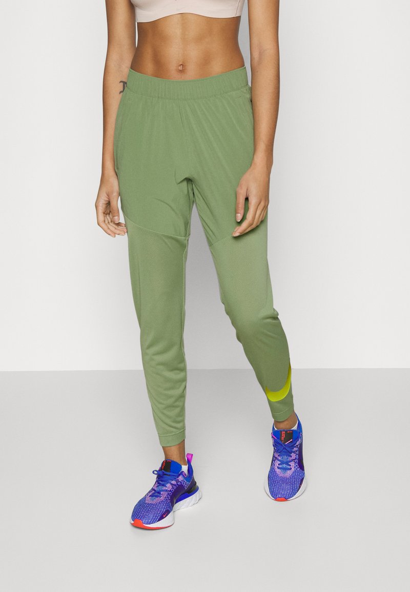Nike Performance W NK DF RUN Tracksuit bottoms oil green/(reflect