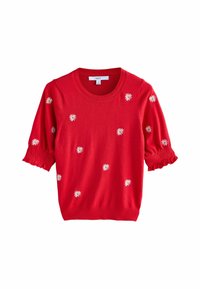 Pull court en tricot rouge à manches courtes avec broderie de marguerite. Présente un col rond et des manches smockées. Texture lisse, coupe décontractée.
