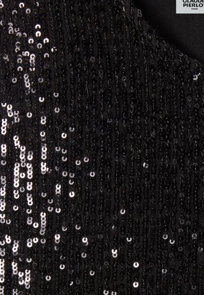 Tessuto di paillettes nere con una superficie testurizzata. Presenta paillettes rotonde lucide disposte in linee verticali, creando un effetto scintillante.