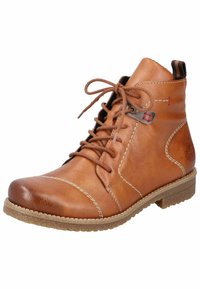 Bottines en cuir marron avec un bout arrondi, un design à lacets et des accents rouges et métalliques. Détails surpiqués et semelle en caoutchouc.