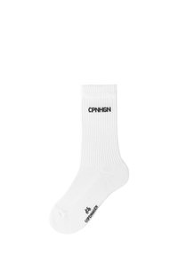 Weißer Baumwollsocken mit geripptem Muster. Mit schwarzem Aufdruck "CPNHGN" auf der Oberseite. Standard Crew-Länge und verstärkter Zehenbereich.