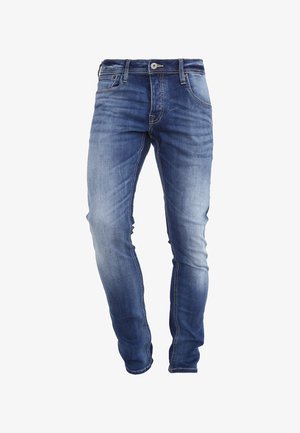 Schmal geschnittene blaue Jeans aus Denim mit einer ausgewaschenen Optik, Five-Pocket-Design und Reißverschluss. Mit Ziernähten und einem klassischen Metalldruckknopf.