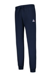 Navyblauwe joggingbroek gemaakt van een katoenmix, met een elastische tailleband met koord en cuffs bij de enkels; geborduurd logo-detail.