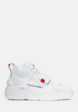 White athletic sneaker with a textured upper, featuring a prominent strap and red accents, thick sole, and "POLO SPORT" branding on the side.