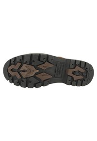 Suela de goma negra con profundas trapas y acentos marrones, que presenta un diseño robusto para una mejor adherencia y durabilidad.
