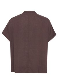 Chemise en lin marron avec une coupe décontractée, manches courtes et une texture subtile. Comprend un empiècement au dos et ne présente aucun système de fermeture visible.