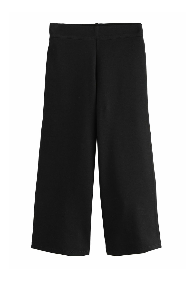 Černé culottes vyrobené z měkké, elastické tkaniny s širokým střihem nohavic, vybavené elastickým pasem a bez viditelných vzorů nebo kování.
