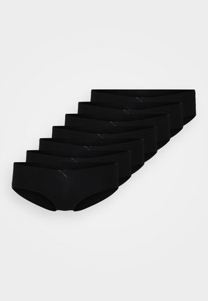 Culottes en coton noir, avec une texture lisse, une ceinture large et un minimum de coutures. Ensemble de huit au design uniforme.