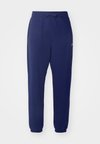 SPORT ESSENTIALS - Tracksuit bottoms - navy