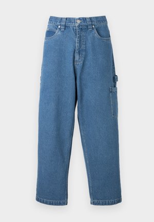 Blue denim cargo pants with a relaxed fit, featuring side pockets and a slightly tapered leg. Material is soft with a smooth texture.