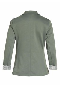 Blazer gris clair pour femme montré de dos avec manches longues et poignets blancs présentant de fines rayures verticales.