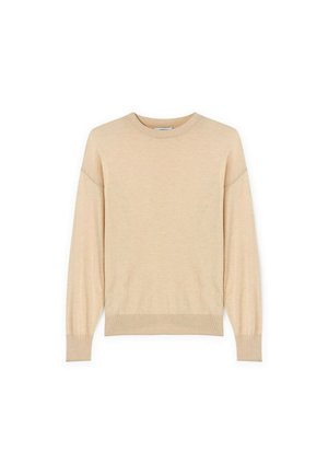 Beige trui van zachte stof, met een ronde halslijn, lange mouwen en geribbelde boorden en onderrand. Eenvoudig ontwerp, zonder patronen of accenten.