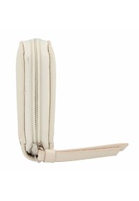Portemonnee met een textuur in crèmekleur, ritsluiting en een afneembare schouderband. Slank profiel en subtiele stiksels.