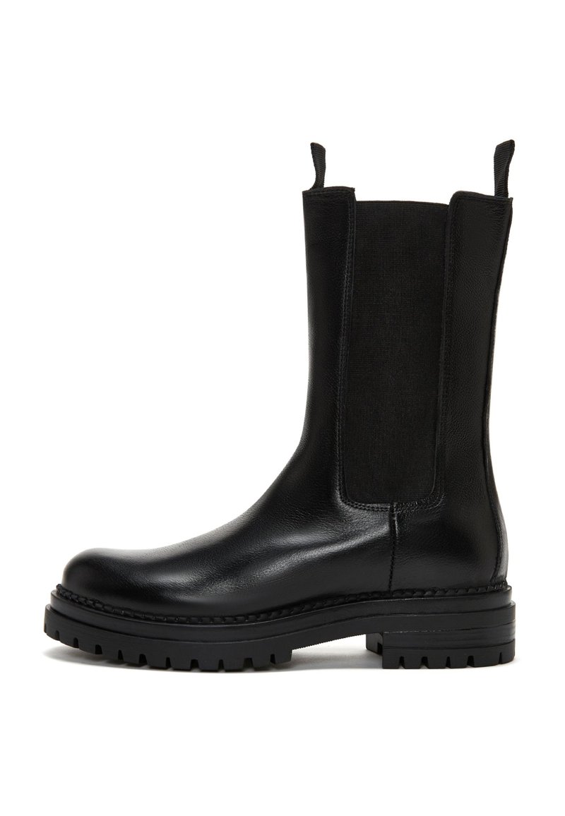 Black ankle boots with a smooth leather upper, elastic side panels, and a chunky rubber sole featuring deep treads for traction.
