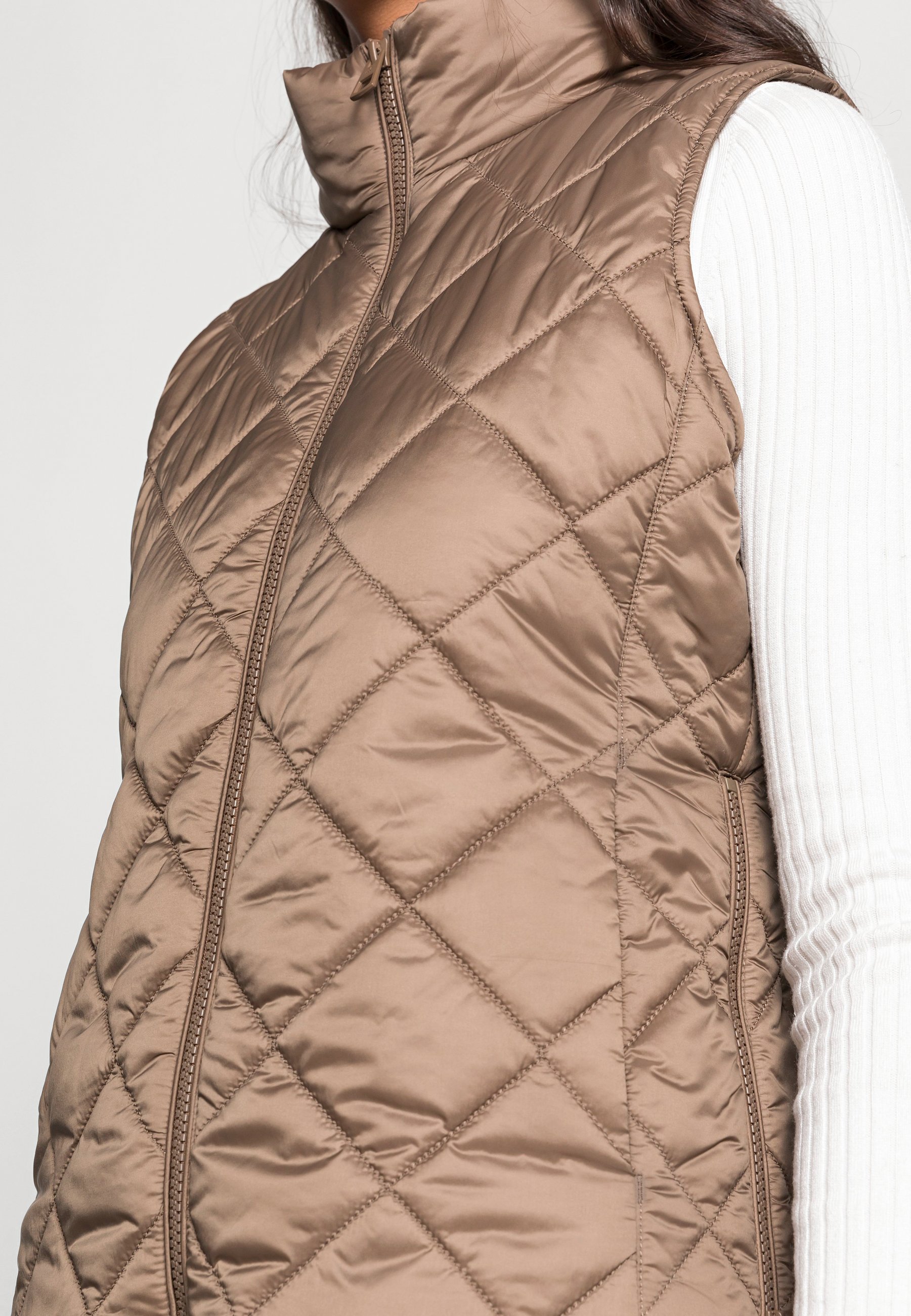 brown polo vest