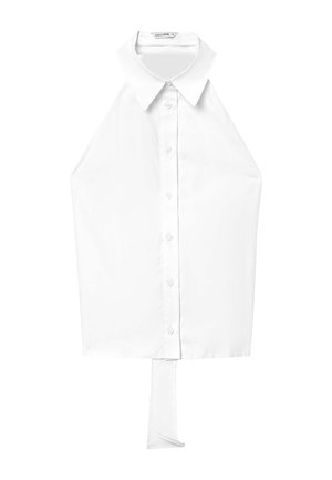 Blusa bianca di tipo halter neck, con colletto classico, chiusura a bottoni e un dettaglio unico sulla schiena allungato. Realizzata in morbido tessuto di cotone.