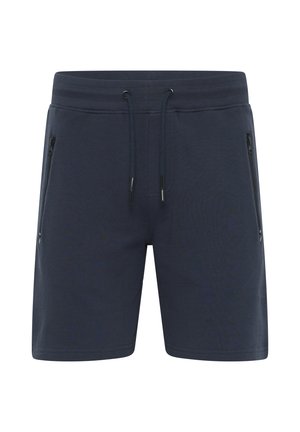 Sötétkék sportnadrág, rugalmas derékpánttal, húzózsinórral és két oldalsó cipzáros zsebbel. Simas texture és testre szabott fazon.