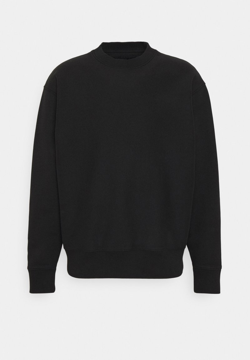 Sweat-shirt noir uni à manches longues avec col rond, poignets et taille côtelés, présenté à plat sur fond blanc.