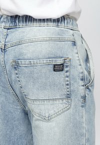 Koroshi Vaqueros slim fit - azul claro